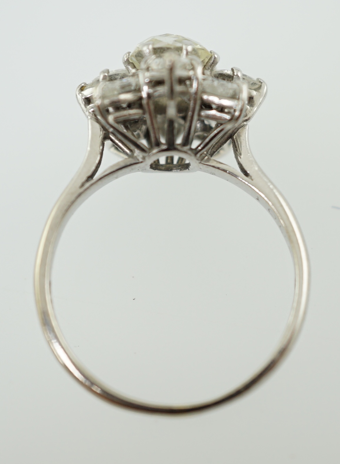 A modern 18ct white gold and diamond flower head cluster ring